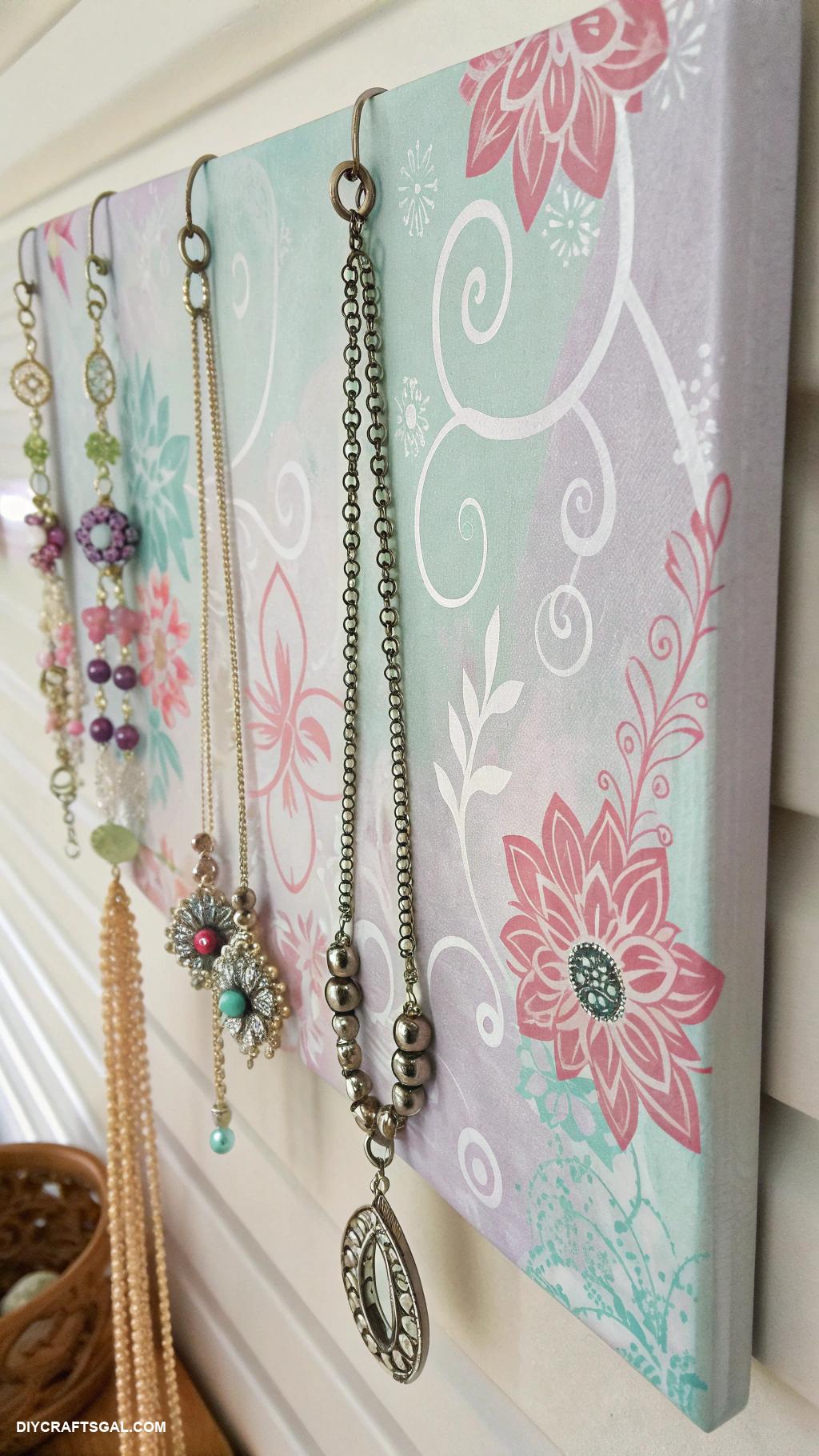 diy necklace holder Painted canvas with hooks installed